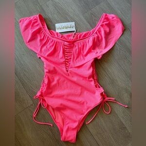 TiniBikini Swimwear Hot Pink Ribbed One-Piece
Swimsuit Ruffle Neckline S…